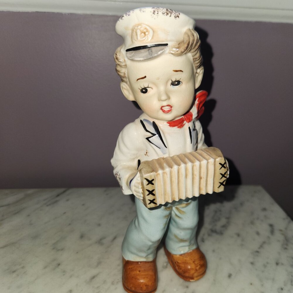 Vintage Ucagco Sailor Boy with Accordion Figurine
